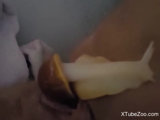 Aroused woman feels a big snail in her cunt during masturbation